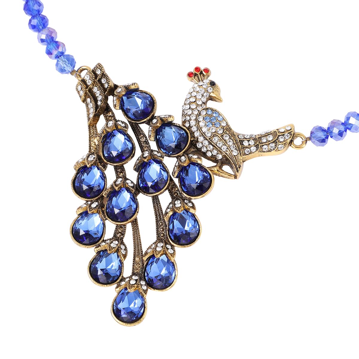 Simulated Blue Magic Color Topa and Blue Austrian Crystal Peacock Necklace 21 Inches in Goldtone image number 4