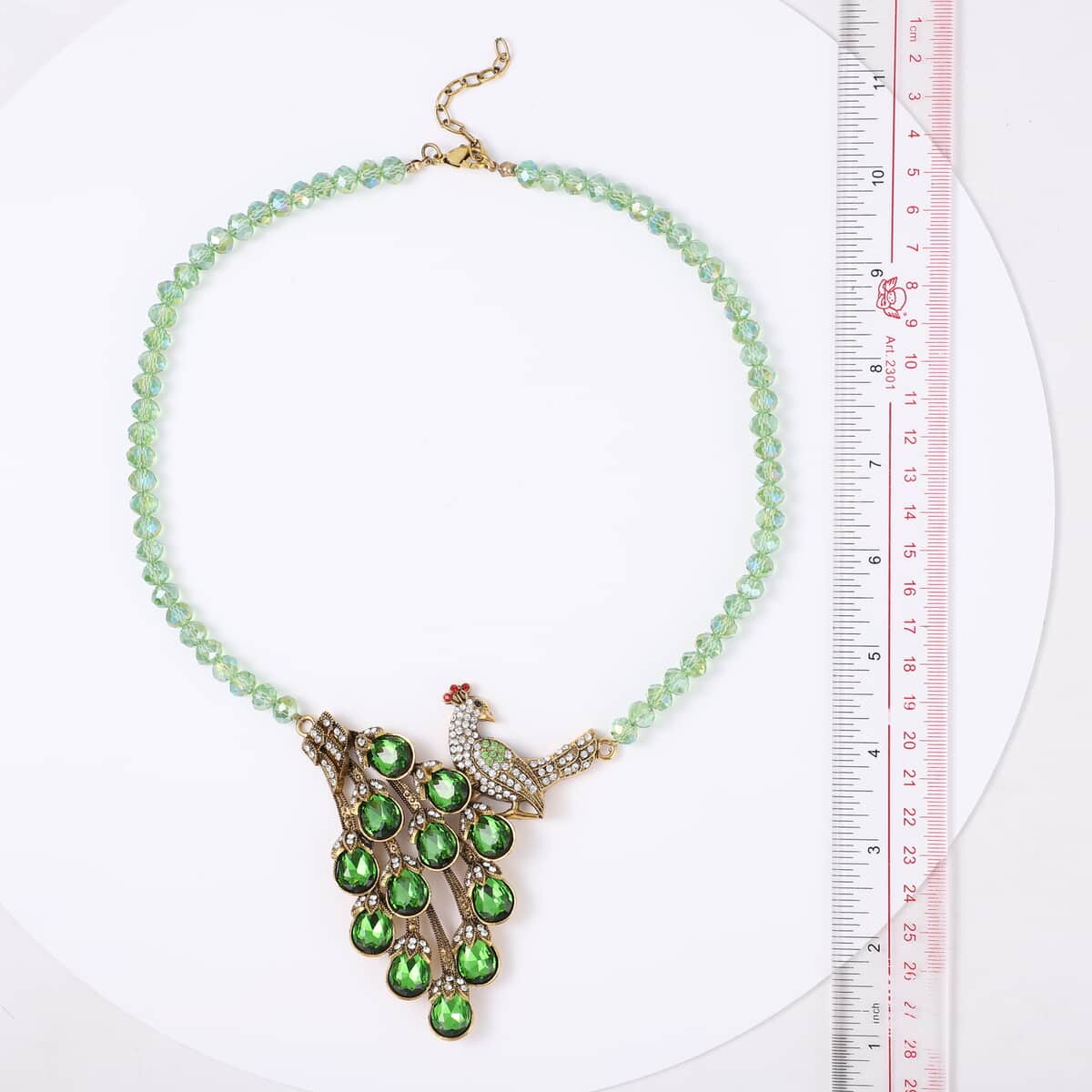 Simulated Green Emerald and Multi Color Crystal Peacock Necklace 21-23 Inches in Goldtone image number 2