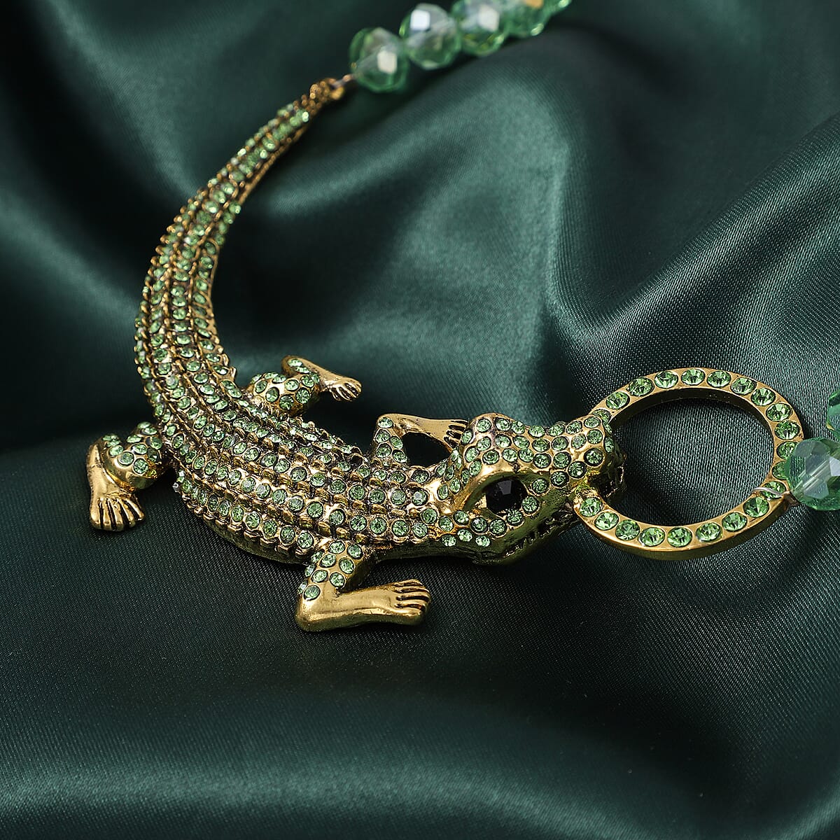 Simulated Green Magic Color Emerald and Green and Black Crystal Crocodile Necklace 21 Inches in Goldtone image number 1