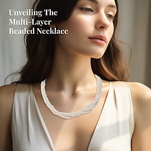 Simulated White Pearl Multi Row Twisted Necklace in Goldtone 23 Inches