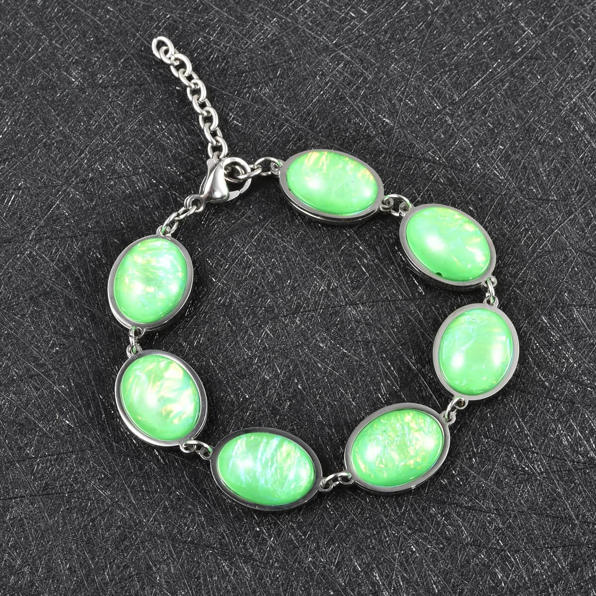 Lab Created Green Color Opal Station Bracelet in Stainless Steel (7.50 -9.00In) image number 1