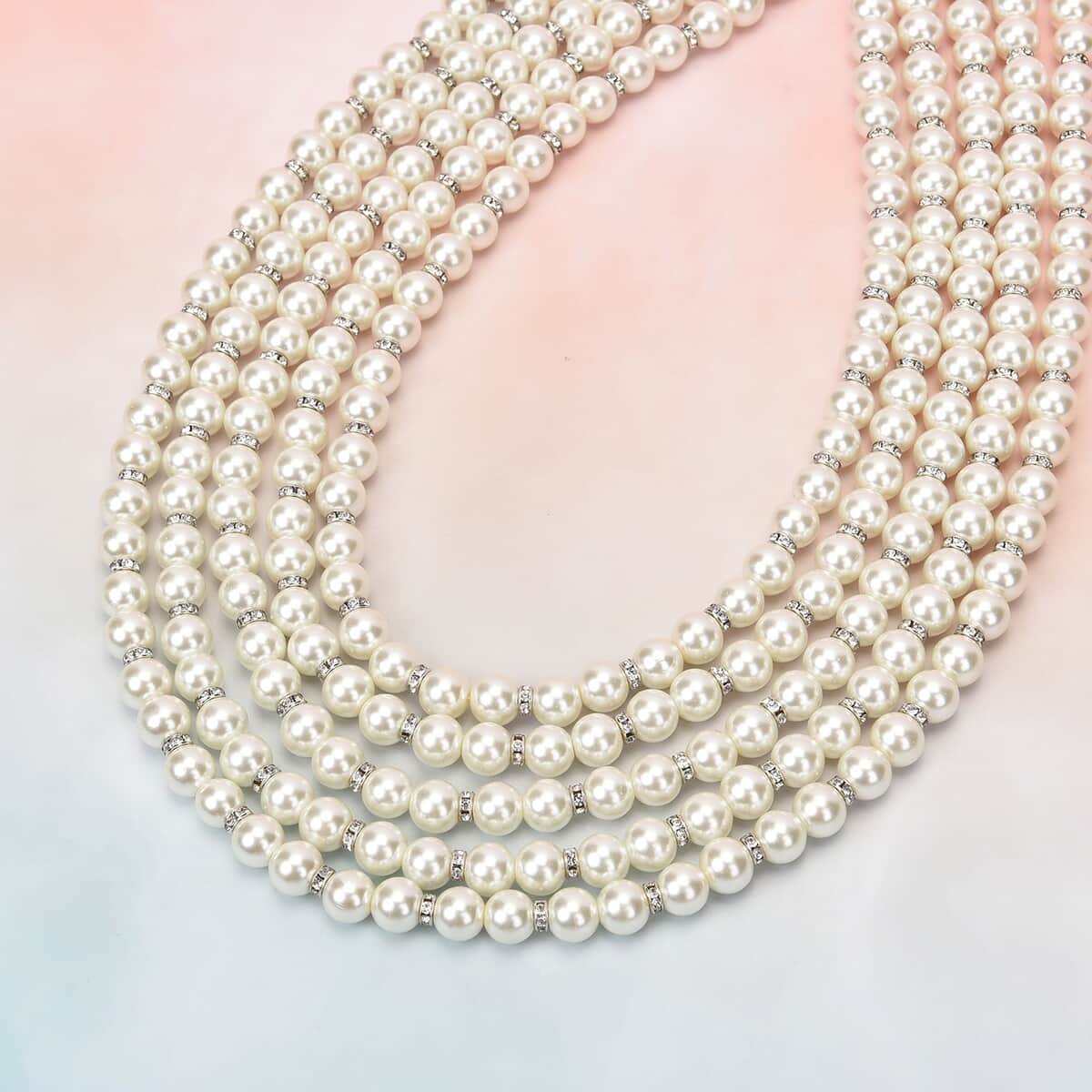 Simulated White Pearl and White Austrian Crystal Multilayer Necklace 22.50-24.50 Inches in Silvertone image number 1