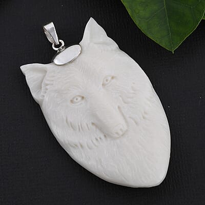 Bali Goddess Carved Bone Garuda Bird Pendant in Sterling Silver