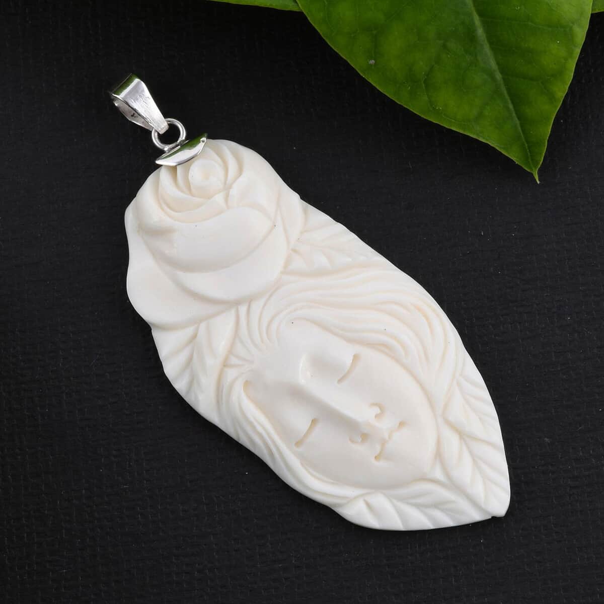 Carved Bone Pendant in Sterling Silver image number 1