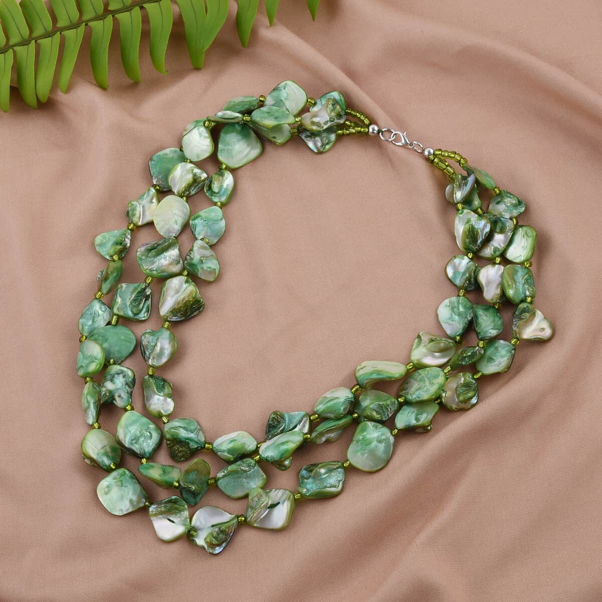 Simulated Green Shell Pearl 3 Strand Necklace 18 Inches in Silvertone image number 1