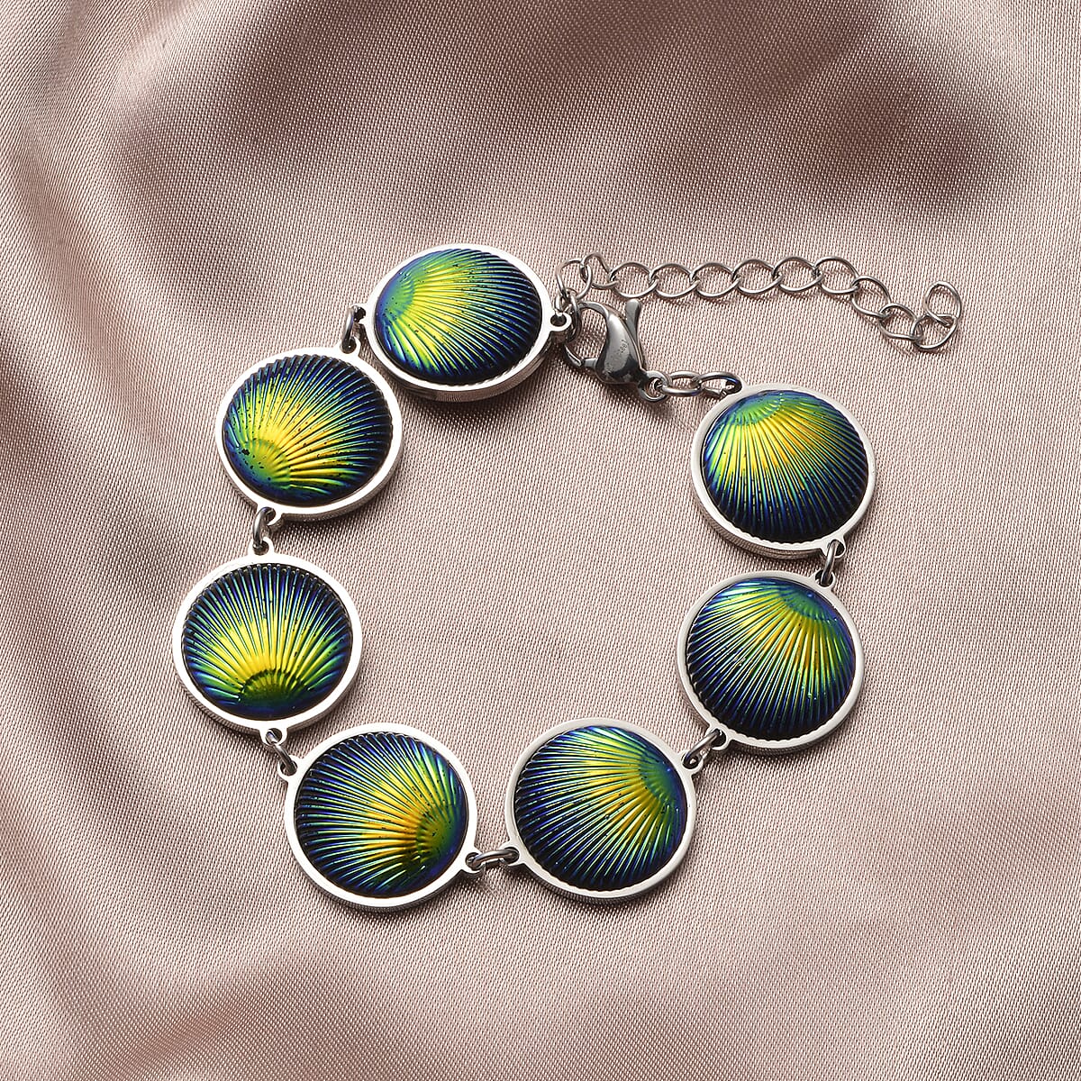 Simulated Blue Magic Color Topaz Seashell Charm Station Bracelet in Stainless Steel (7.50-9.50In) image number 1