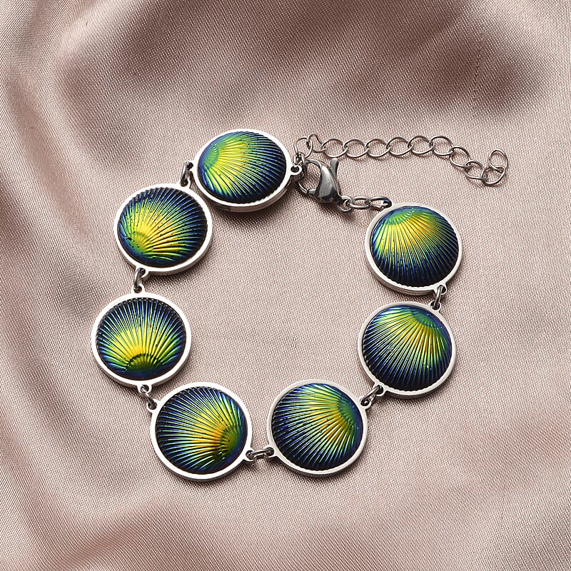 Simulated Blue Magic Color Topaz Seashell Charm Station Bracelet in Stainless Steel (7.50-9.50In)