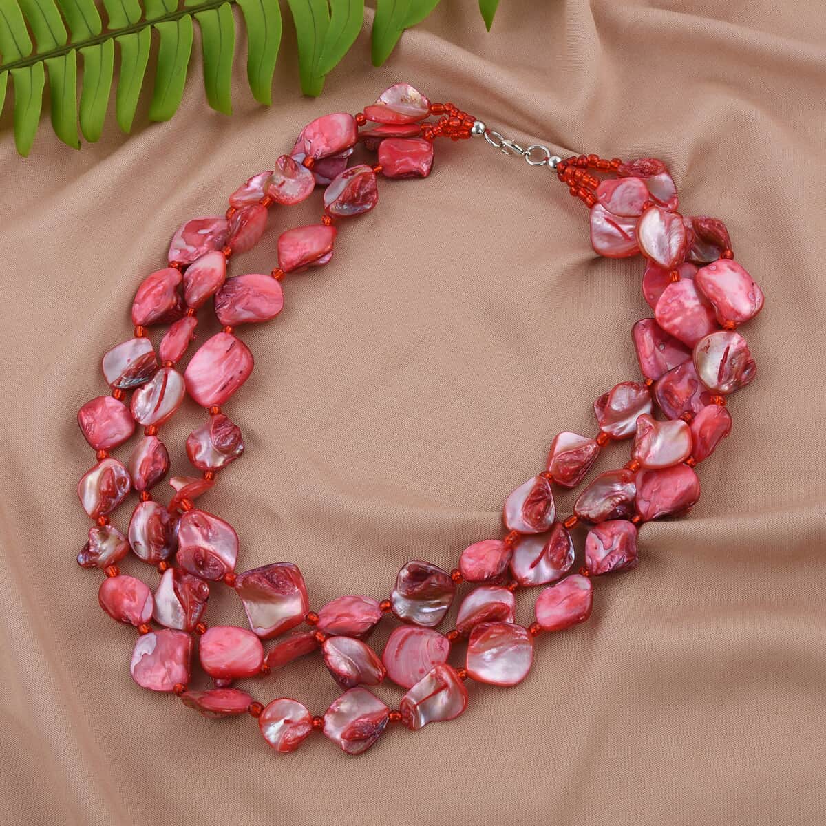 Simulated Red Pearl Multi Strand Necklace 18 Inches in Silvertone image number 1