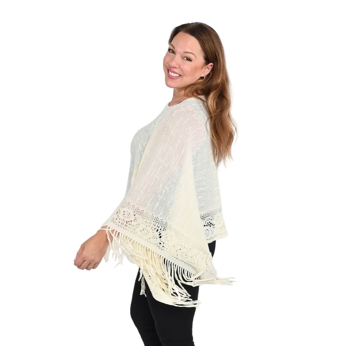 White Solid Poncho with Bottom Cut Work and Tassels image number 1