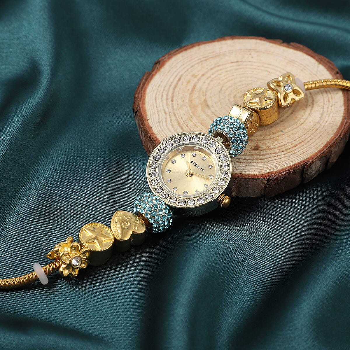 Strada Blue and White Crystal Japanese Movement Charm Bracelet Watch in Goldtone (up to 10.5 inches) image number 1