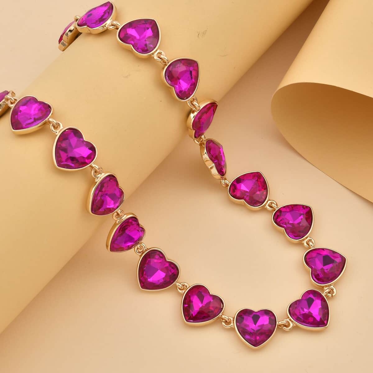 Fuchsia Color Glass Heart Necklace 20-22 Inches in Goldtone image number 1