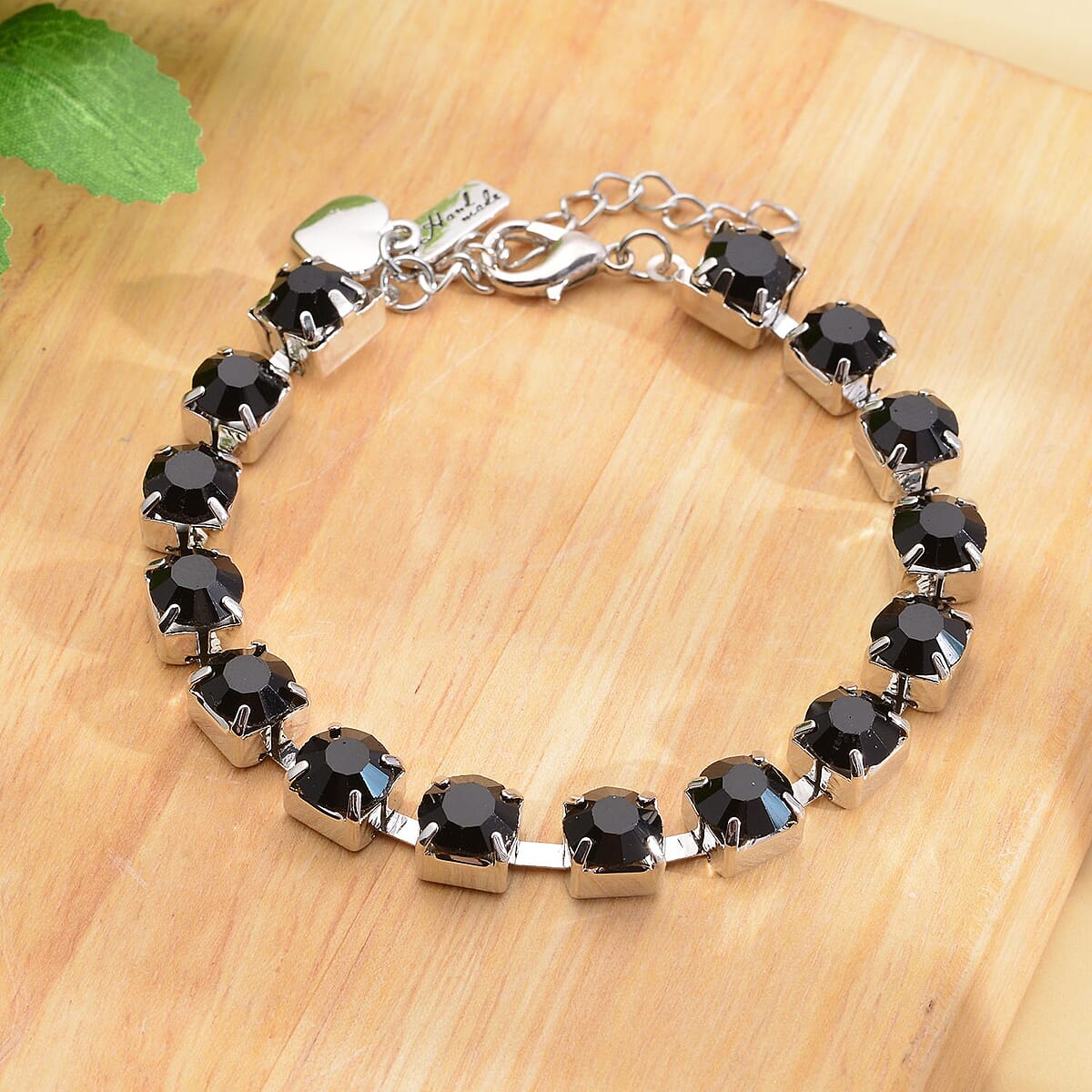 Black Austrian Crystal Bracelet with Heart Charm in Silvertone (7.50-9.50In) image number 1
