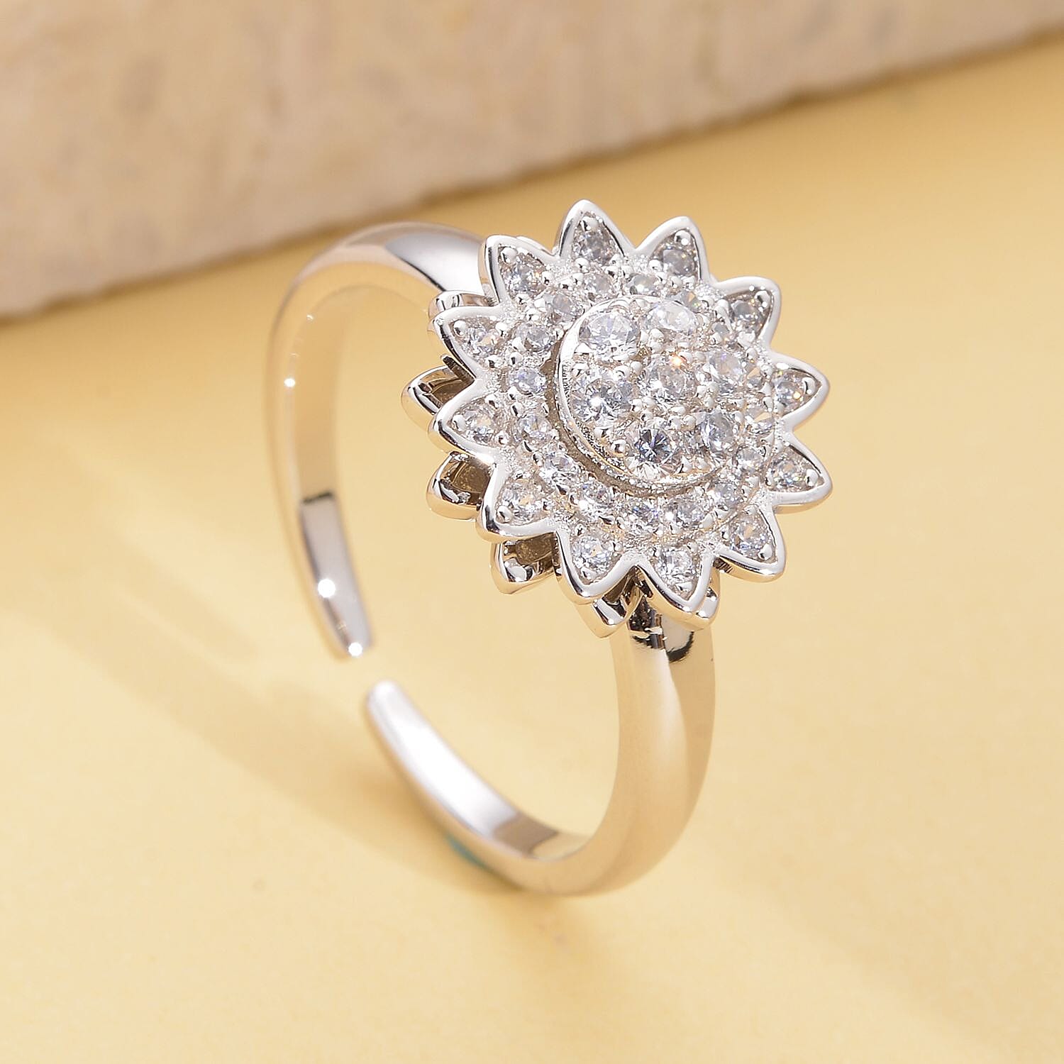 Simulated Diamond Sunflower Design Spinner Ring in Rhodium Over Sterling Silver (Adjustable Size 6-8) 0.65 ctw