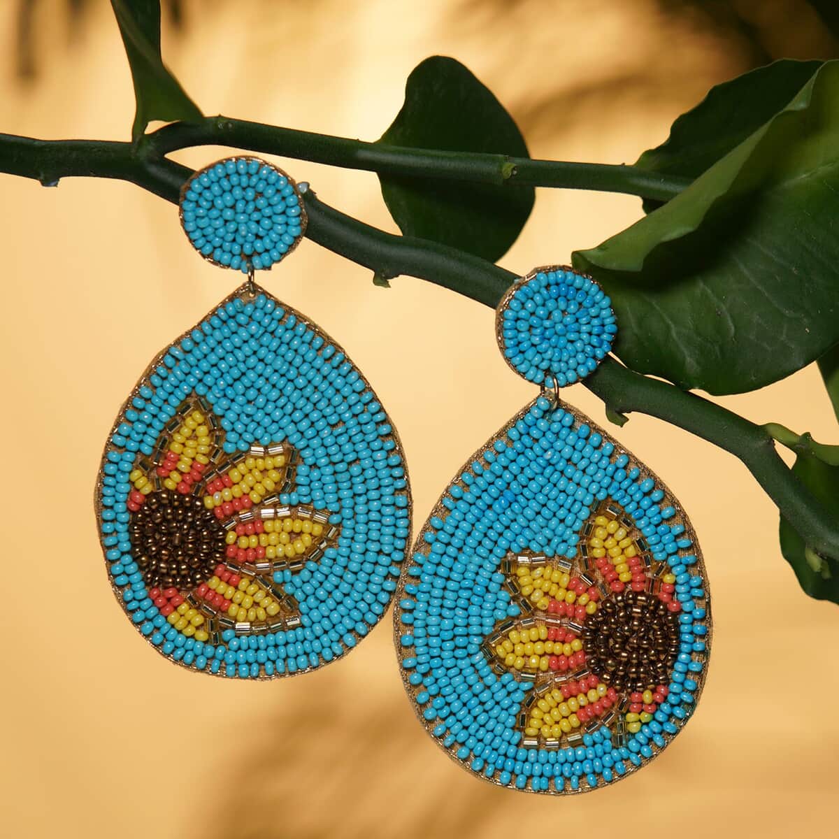 Handcrafted Turquoise Seed Beaded Sunflower Design Earrings in Goldtone image number 1