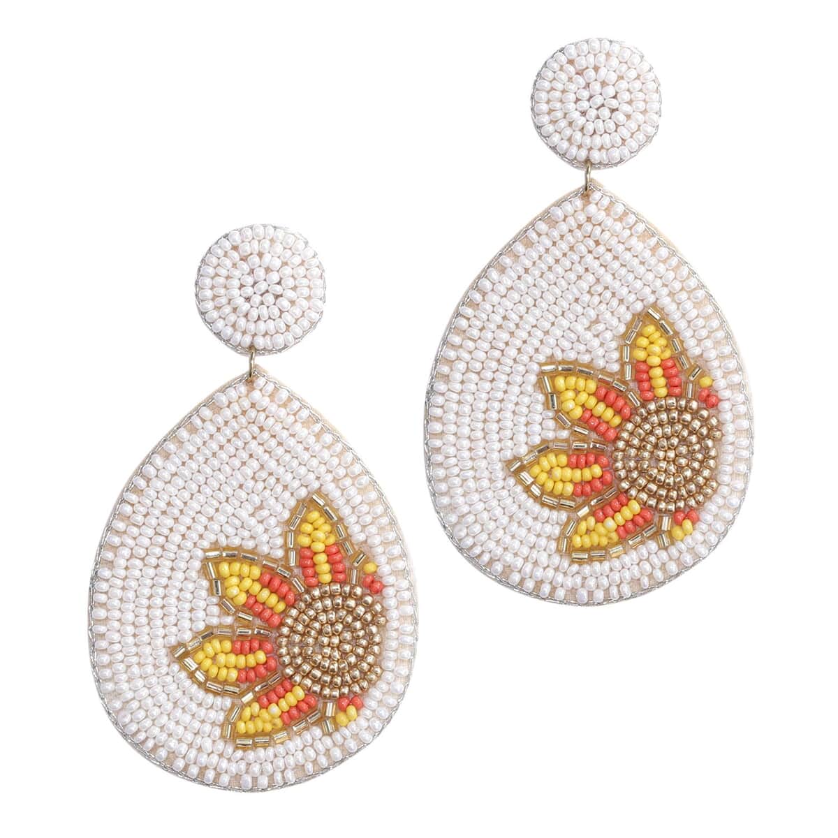 Handcrafted White Seed Beaded Sunflower Design Earrings in Goldtone image number 0