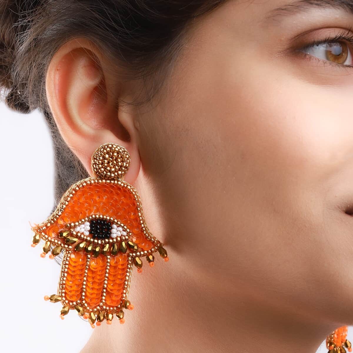 Handcrafted Orange Seed Beaded Hamsa Design Earrings in Goldtone image number 2