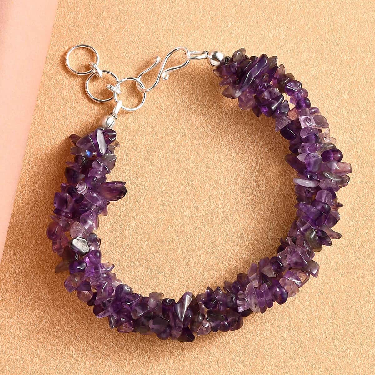 Amethyst Chips Twisted Bracelet in Platinum Over Sterling Silver (7.25 In) 80.65 ctw image number 1