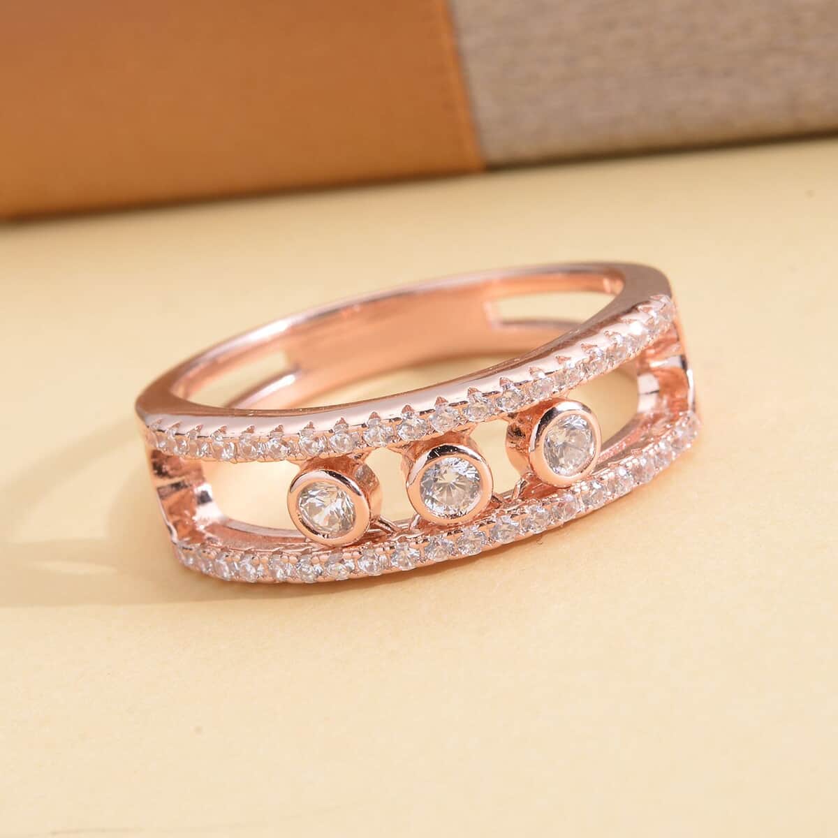Sliding Simulated Diamond Ring in 14K Rose Gold Over Sterling Silver (Size 5.0) 0.85 ctw image number 1