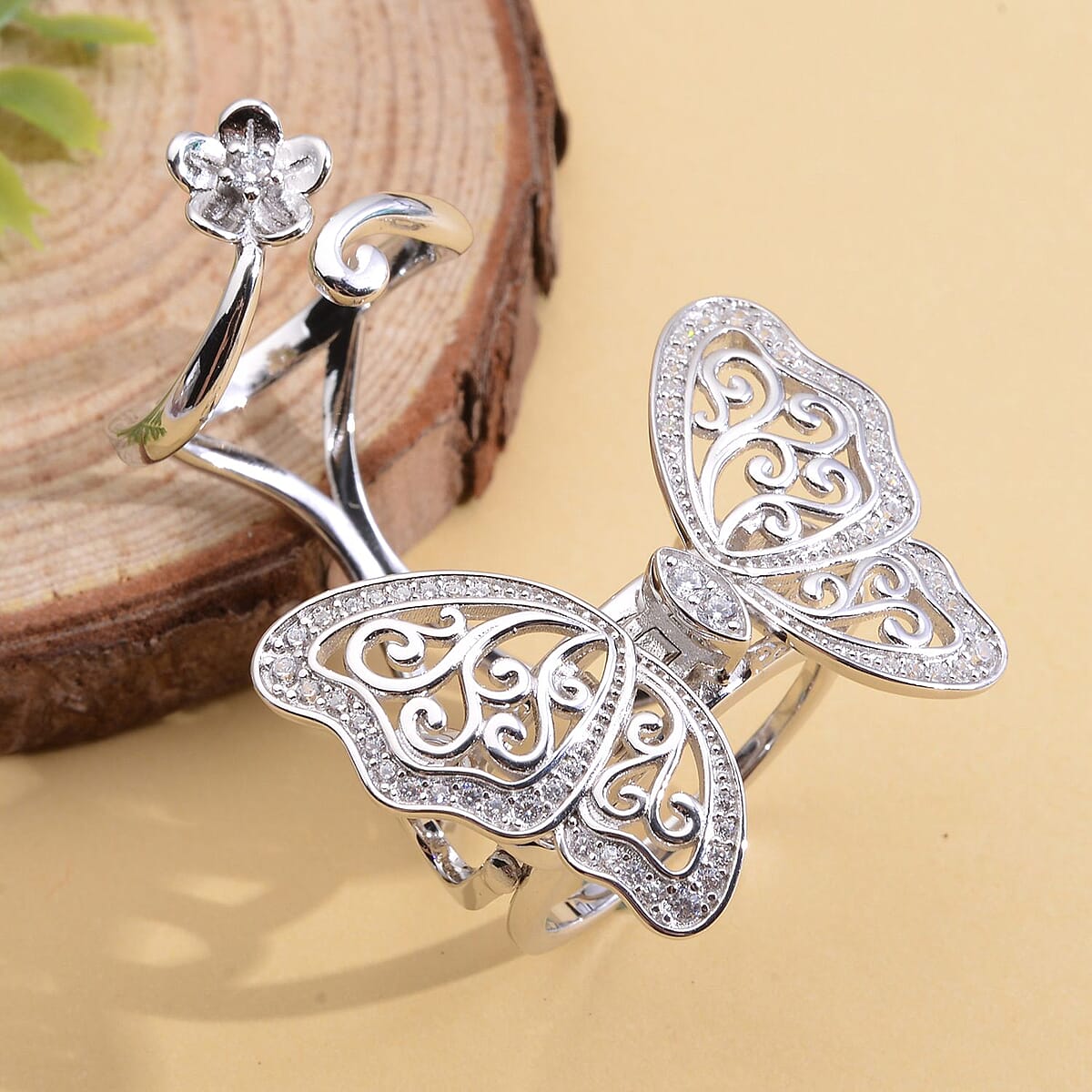 Simulated Diamond Moving Wings Butterfly Ring in Rhodium Over Sterling Silver (Size 5.0) 10.50 Grams 0.75 ctw image number 1