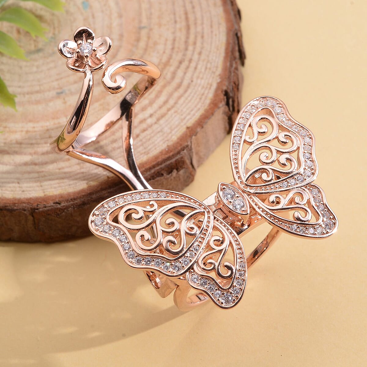 Simulated Diamond Moving Wings Butterfly Ring in 14K Rose Gold Over Sterling Silver (Size 6.0) 10.50 Grams 0.75 ctw image number 1