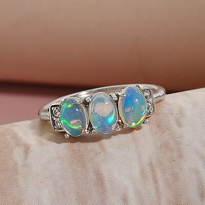Ethiopian Welo Opal and White Zircon 3 Stone Ring in Platinum Over Sterling Silver (Size 10.0) 0.90 ctw