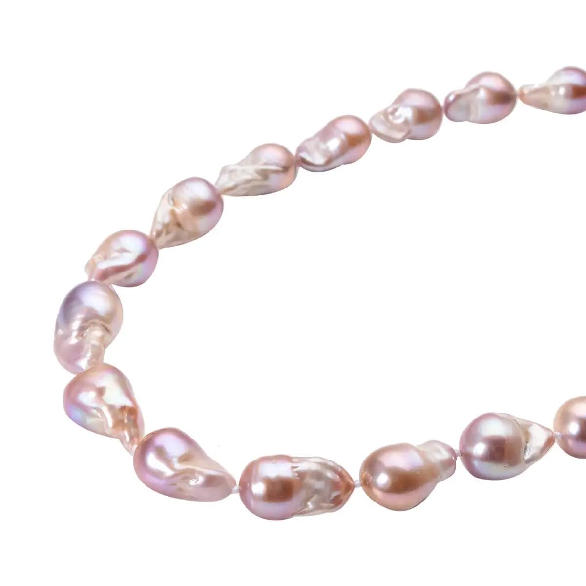 Pink, Champagne, and White colored baroque shape fresh water pearl