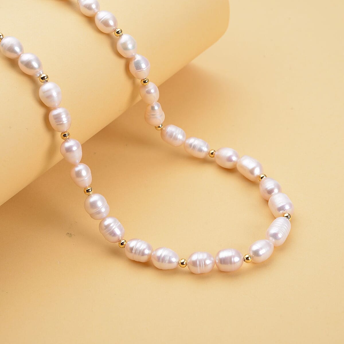 White Freshwater Pearl 6-8mm Necklace 18-20 Inches in Goldtone image number 1
