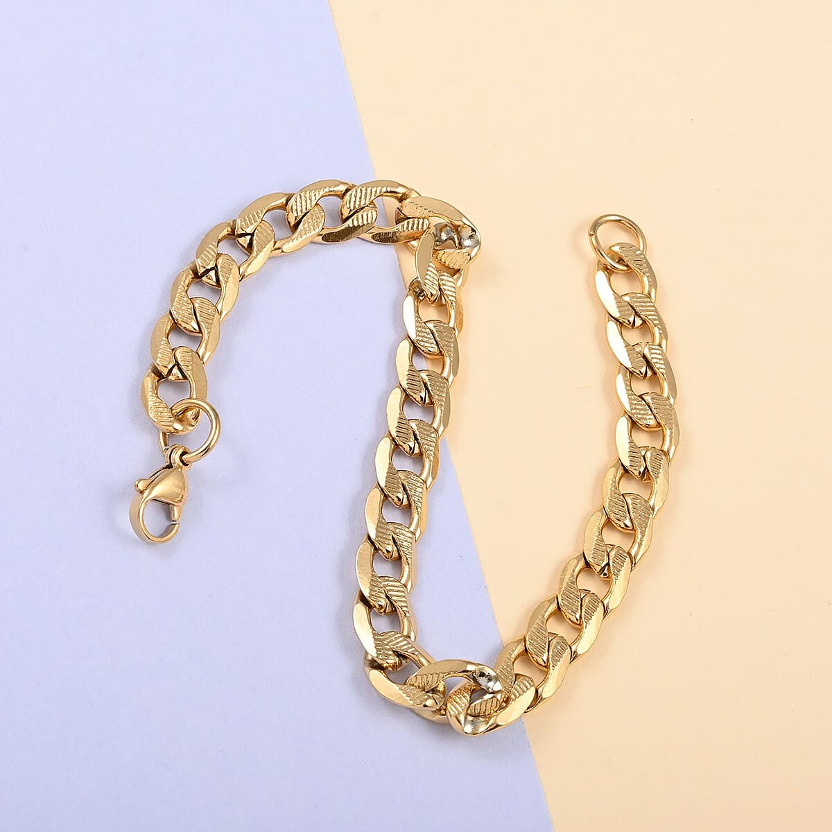 7.75mm Cuban Link Bracelet in ION Plated YG Stainless Steel (8.00 In) 15.20 Grams image number 1