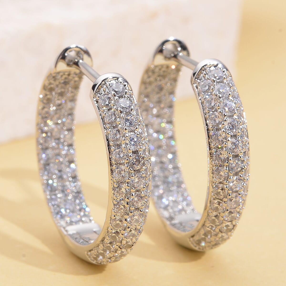 Simulated Diamond Hoop Earrings in Silvertone 3.65 ctw image number 1