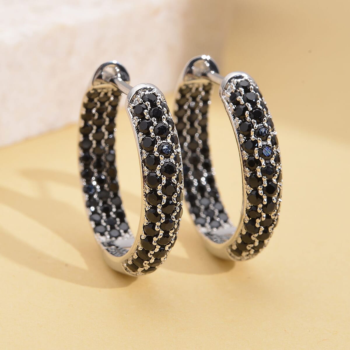 Simulated Black Diamond Hoop Earrings in Silvertone 3.65 ctw image number 1