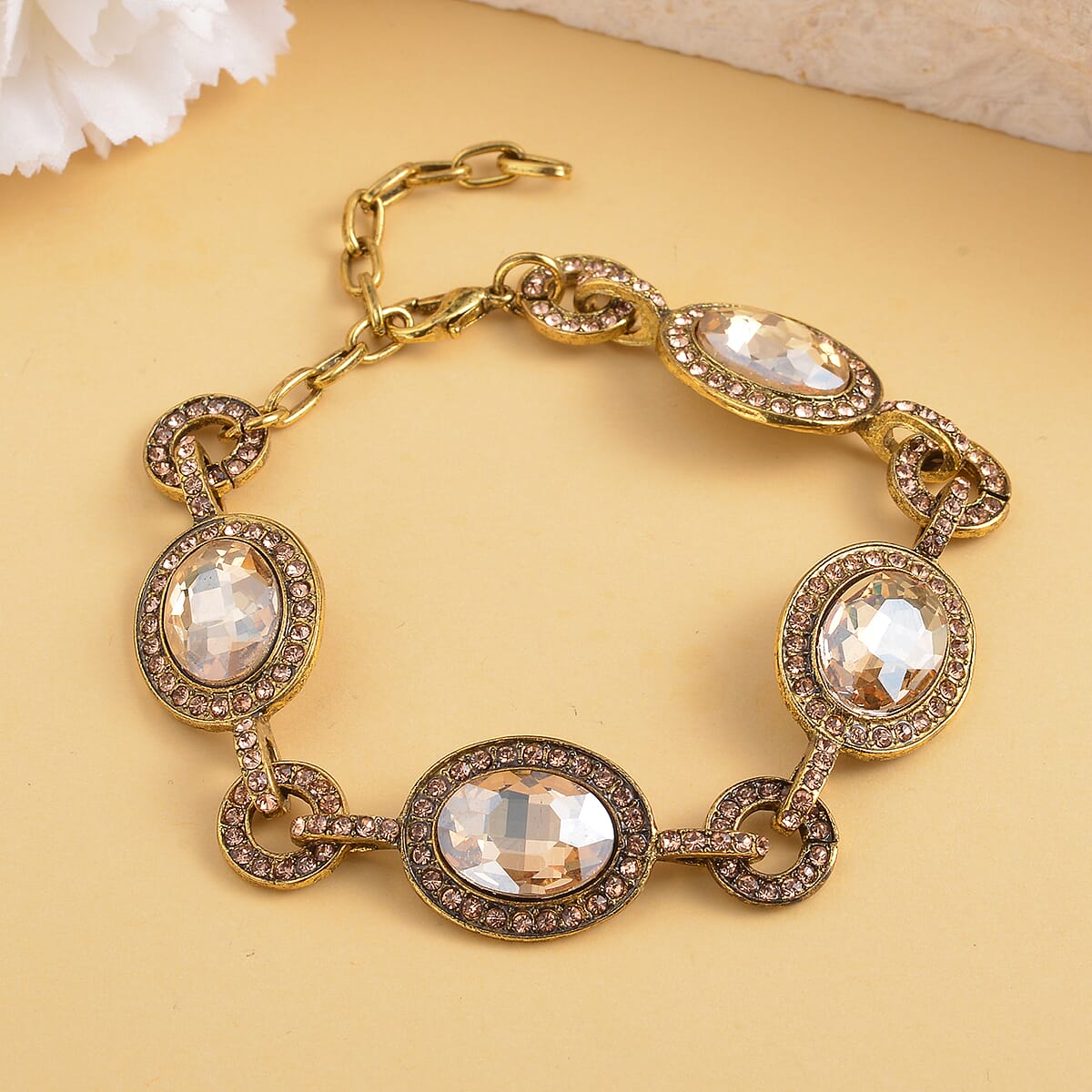Simulated Champagne Quartz and Champagne Color Austrian Crystal Bracelet in Goldtone (7.50-9.0In) image number 1
