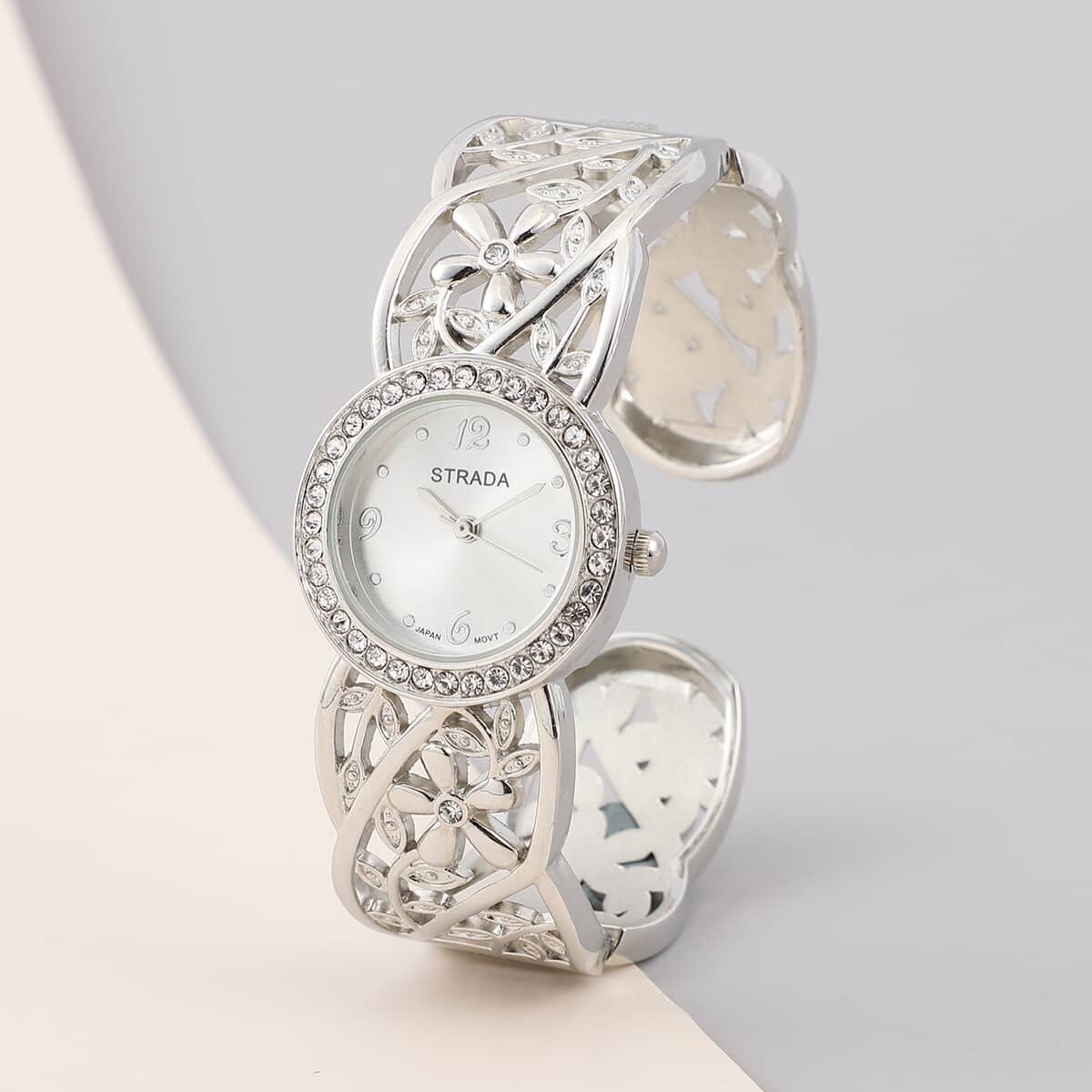 STRADA Austrian Crystal Japanese Movement Flower and Leaf Pattern Cuff Bracelet Watch in Silvertone  image number 1