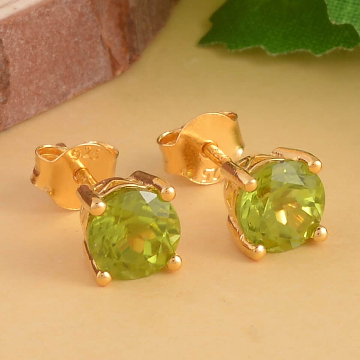 Premium Peridot Solitaire Stud Earrings in Vermeil Yellow Gold Over Sterling Silver 1.90 ctw image number 1