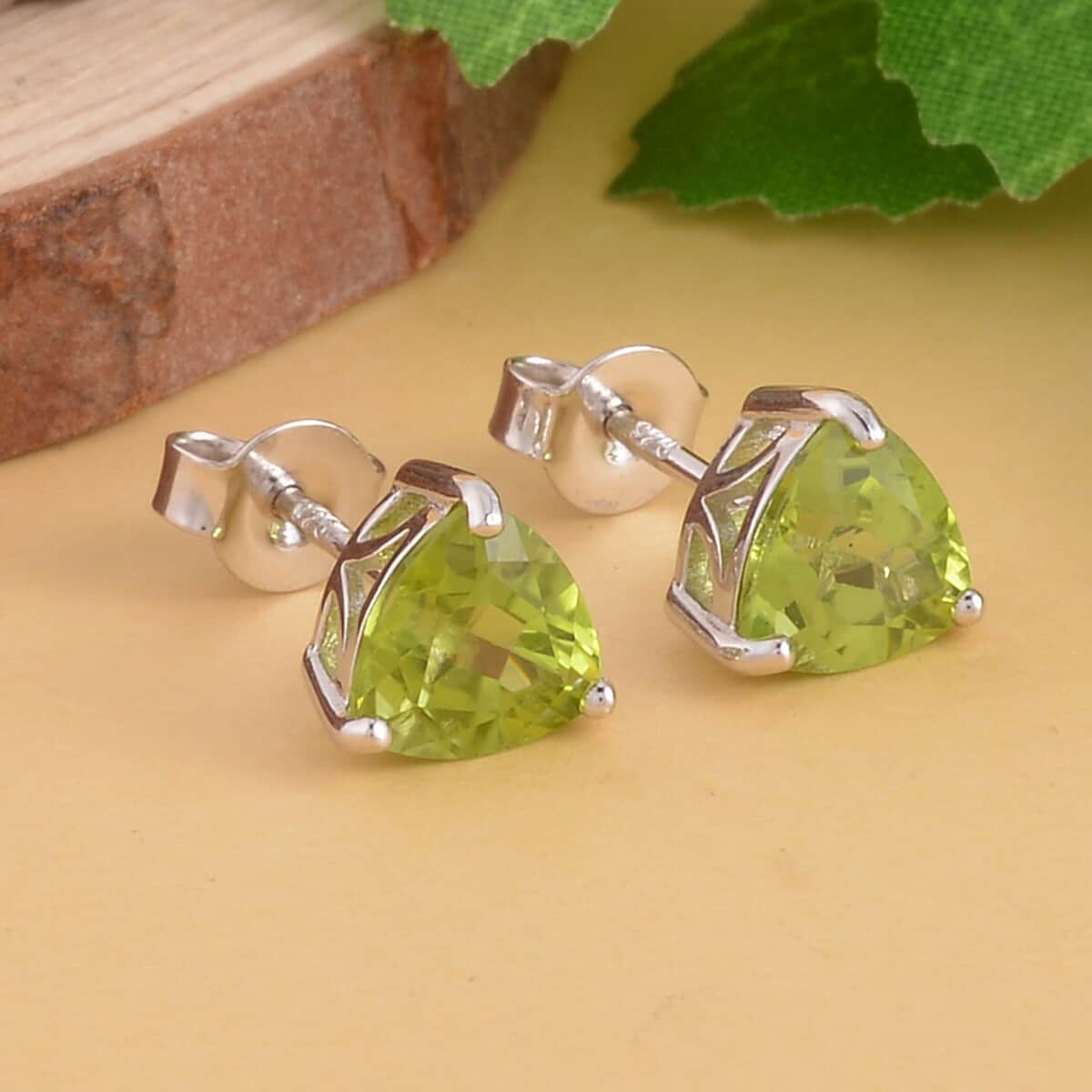 Premium Peridot Solitaire Stud Earrings in Rhodium Over Sterling Silver 2.65 ctw image number 1