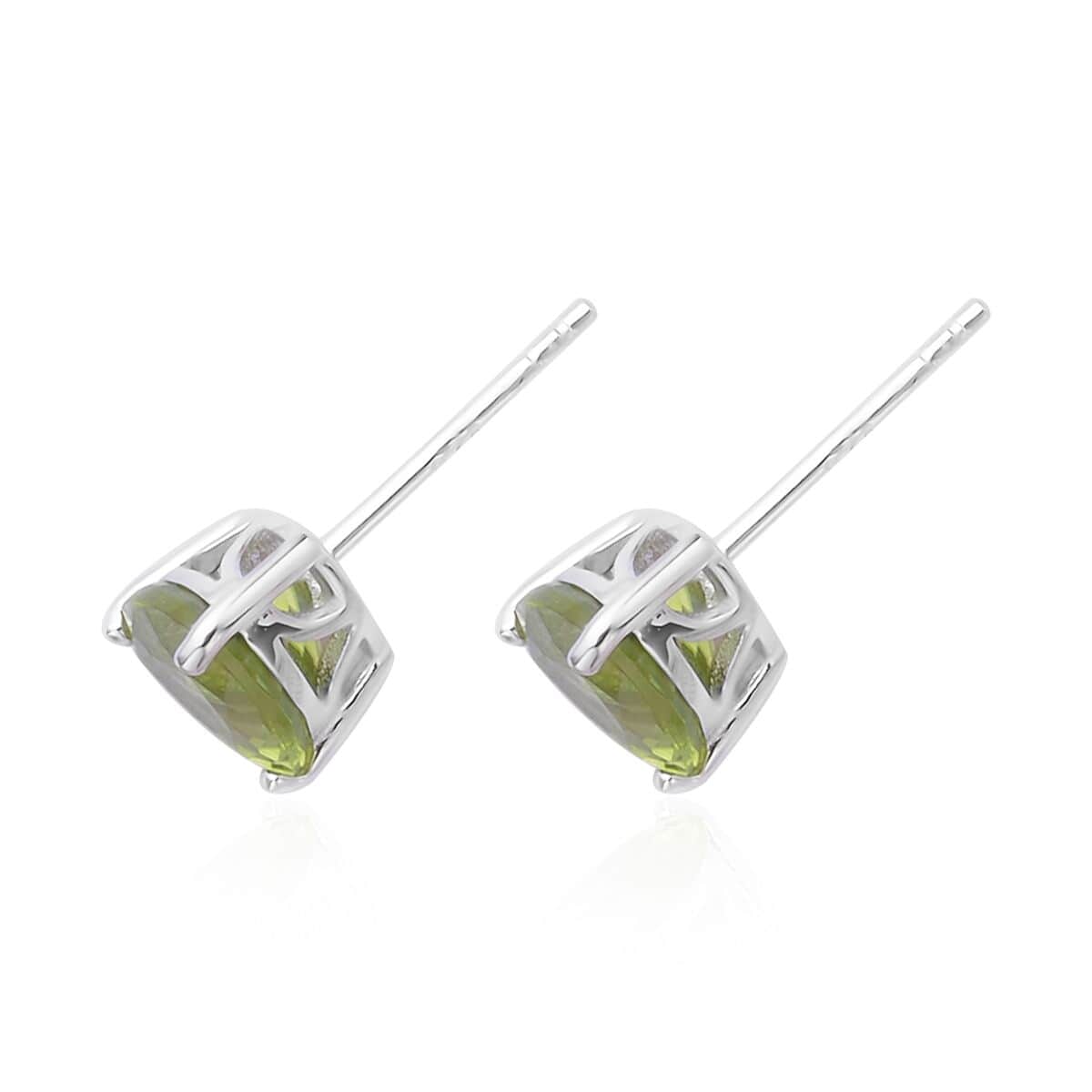 Premium Peridot Solitaire Stud Earrings in Rhodium Over Sterling Silver 2.65 ctw image number 3
