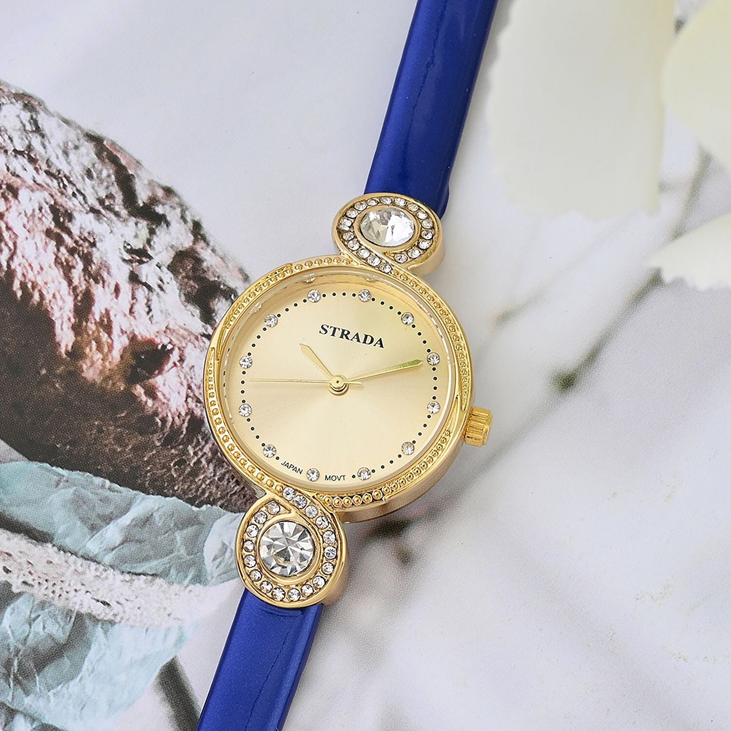 Strada Austrian Crystal Japanese Movement Infinity Watch in Rosetone with Dark Blue Faux Leather Strap (28.20mm) (5.75-7.50 Inches)