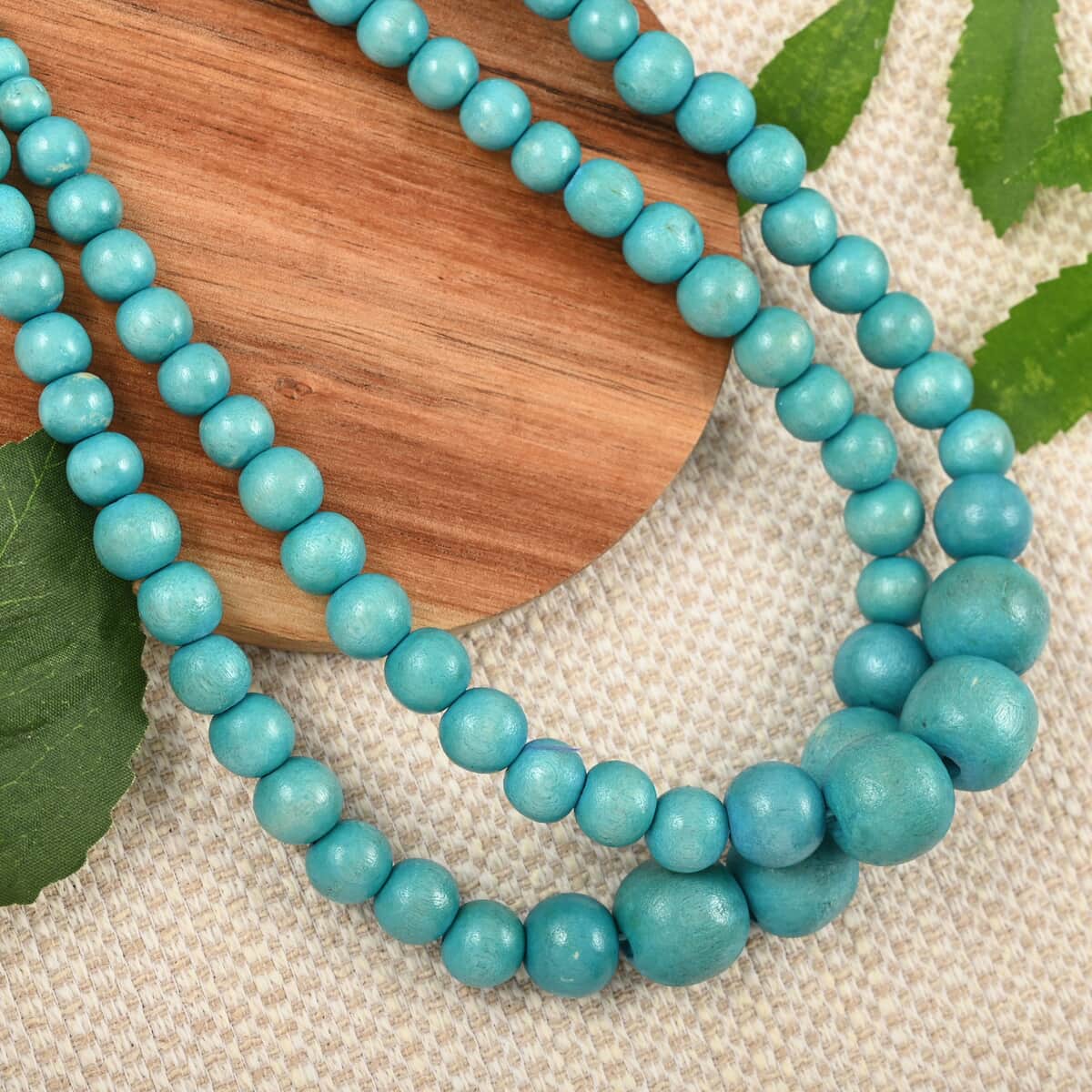 Turquoise Color Wooden Beaded Double Row Necklace 18 Inches in Stainless Steel image number 1