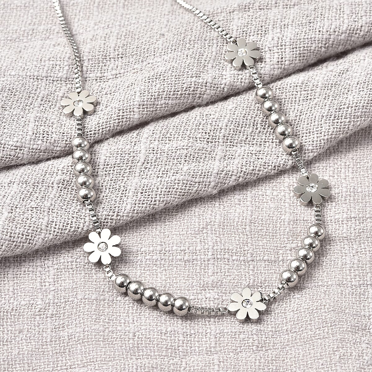 White Austrian Crystal Flower Necklace 17 Inches in Stainless Steel 0.20 ctw image number 1