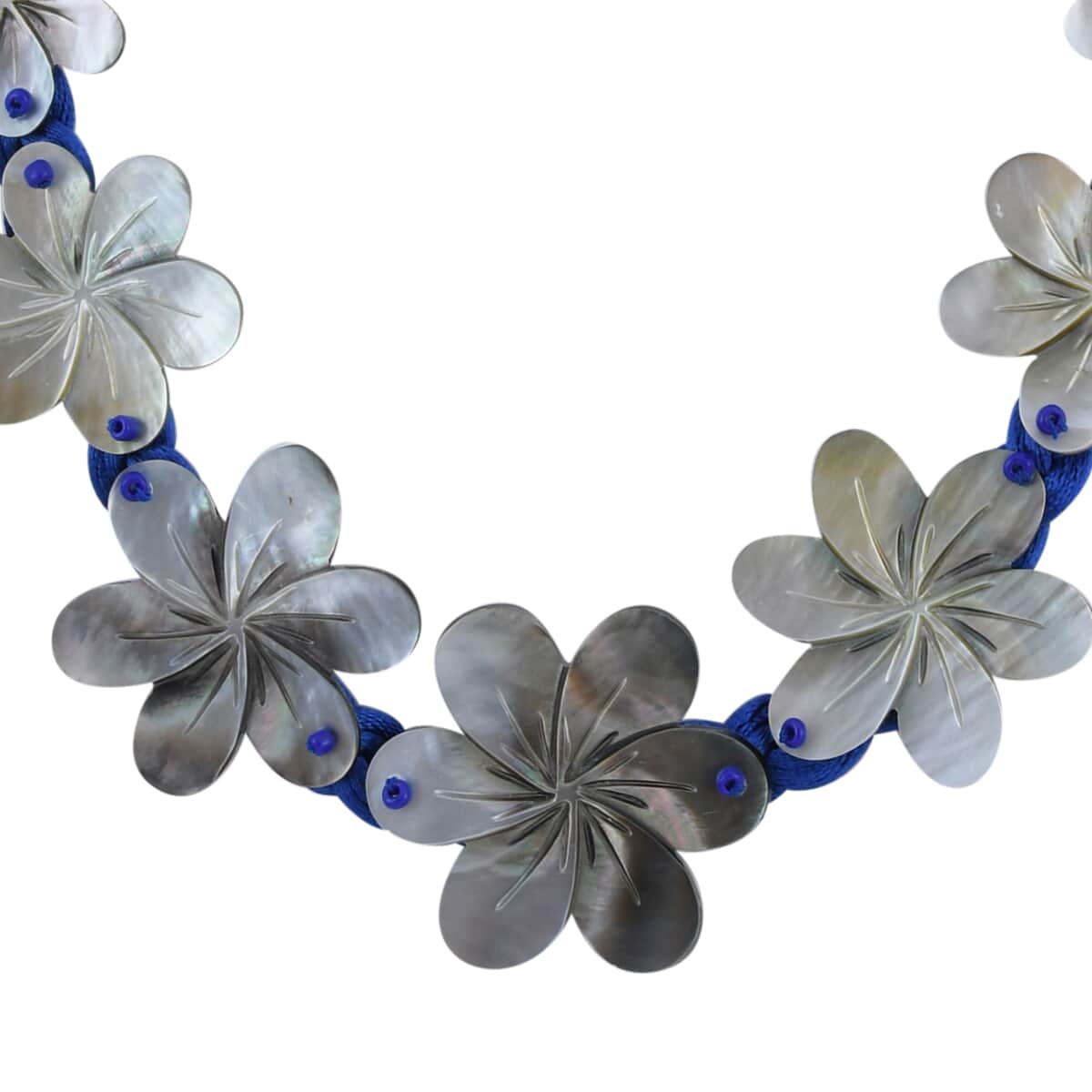 Mother of Pearl Carved Flower and Blue Twisted Nylon Necklace 22 Inches image number 3