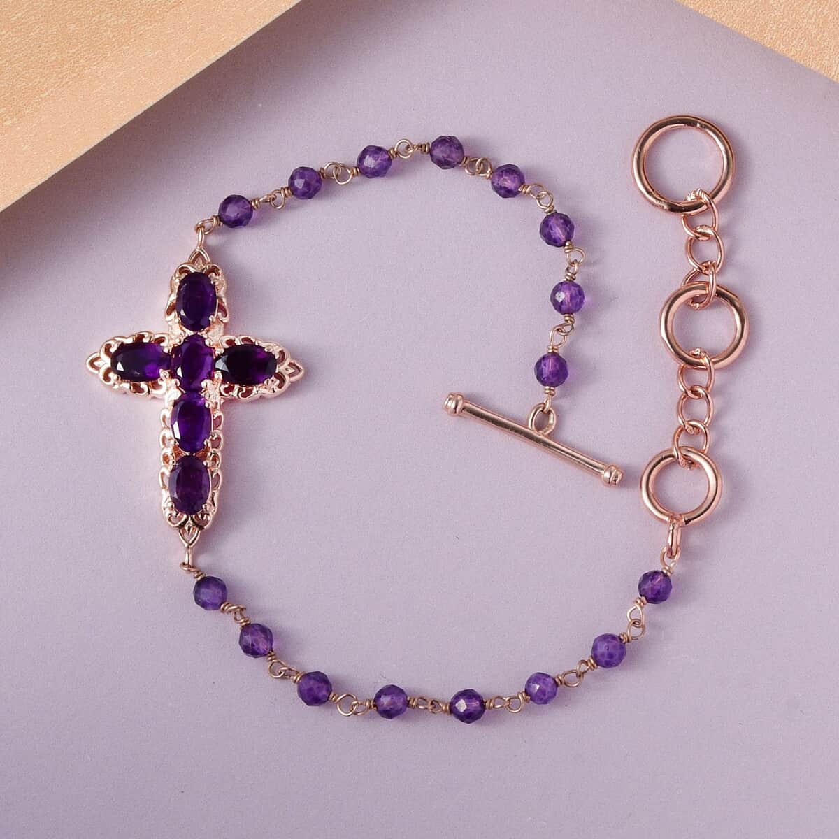 Karis Amethyst Cross Adjustable Bracelet (6.50-8In) with Toggle Clasp in 18K Rose Gold Plated 6.20 ctw image number 1