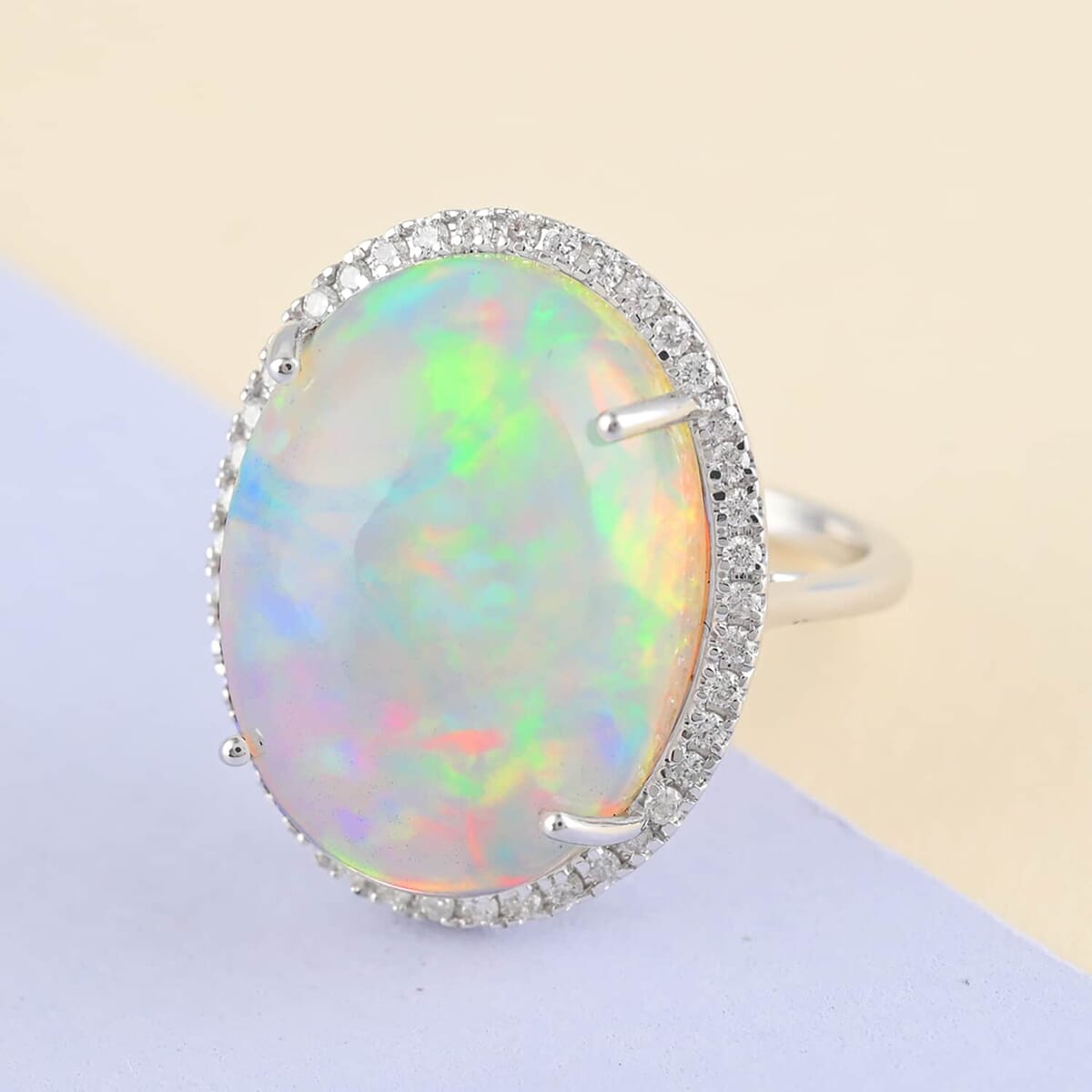 Certified & Appraised Iliana 18K White Gold AAA Ethiopian Welo Opal and G-H SI Diamond Halo Ring (Size 7.0) 4.60 Grams 13.40 ctw image number 1
