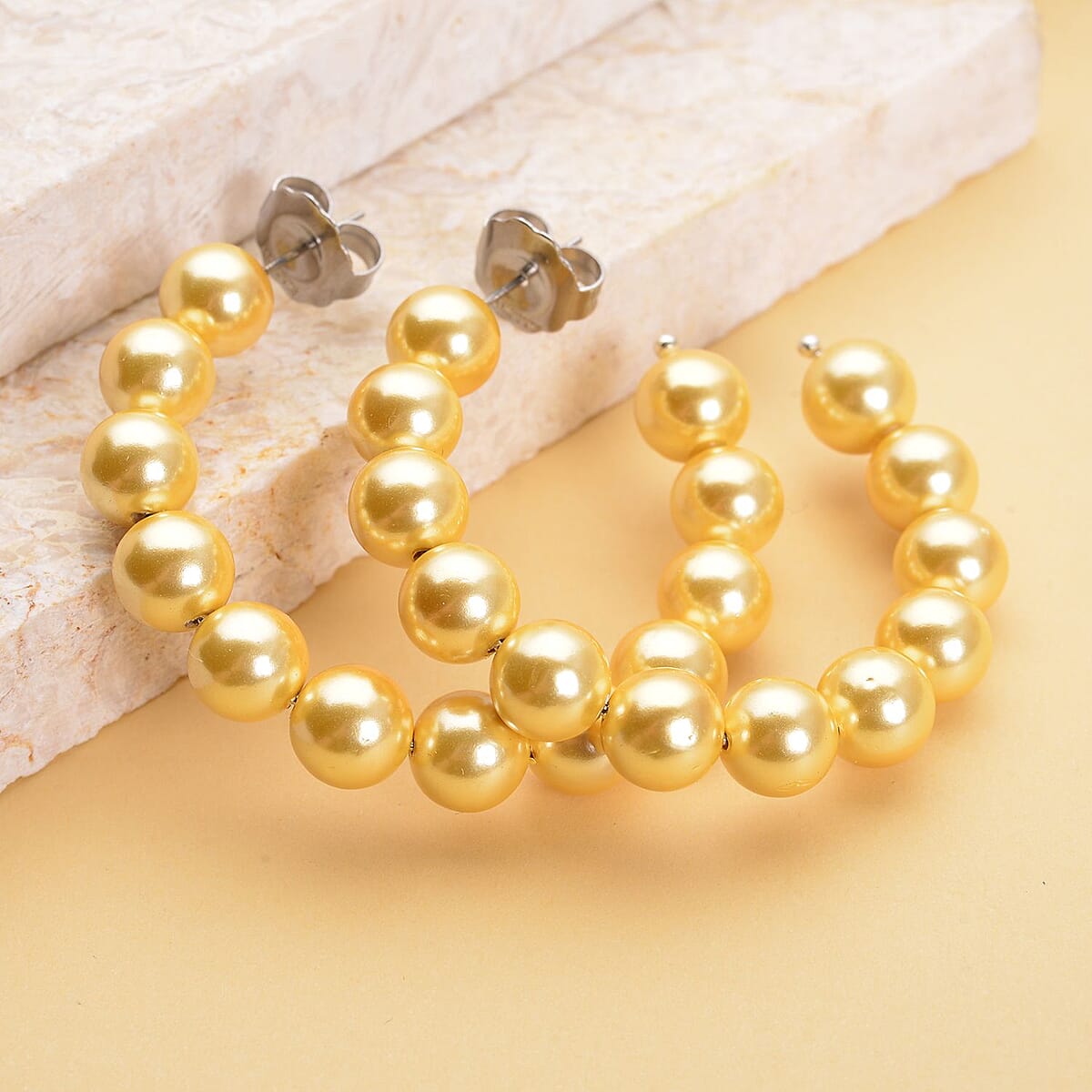 Golden Shell Pearl J-Hoop Earrings in Stainless Steel image number 1