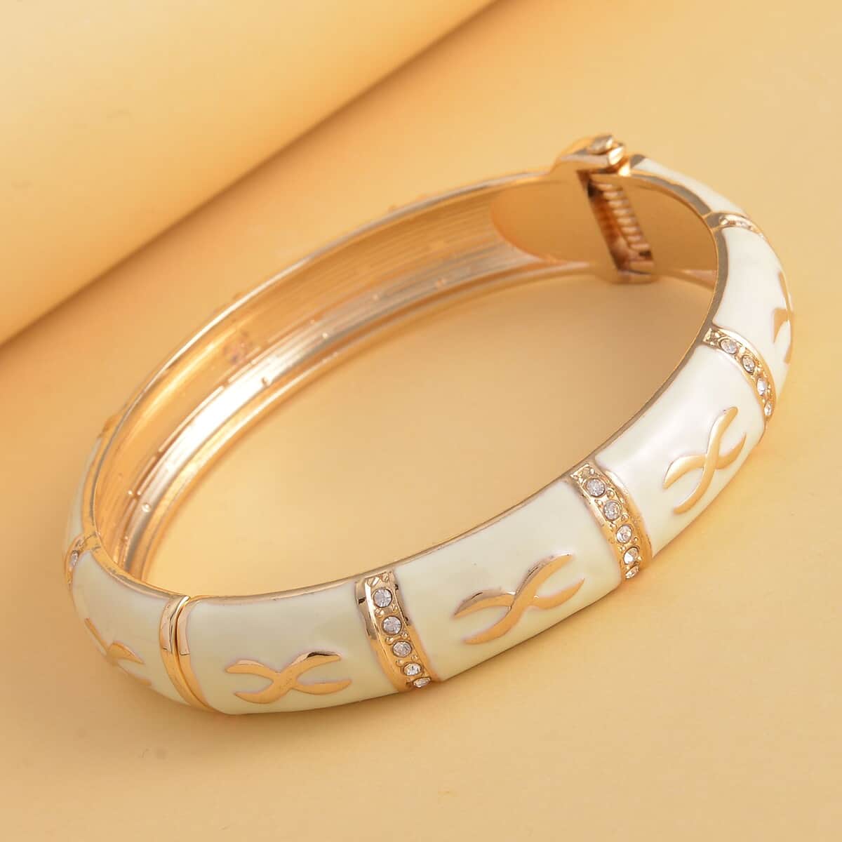 White Austrian Crystal and Cream Enameled Bangle Bracelet (7.25 In) in Goldtone image number 1