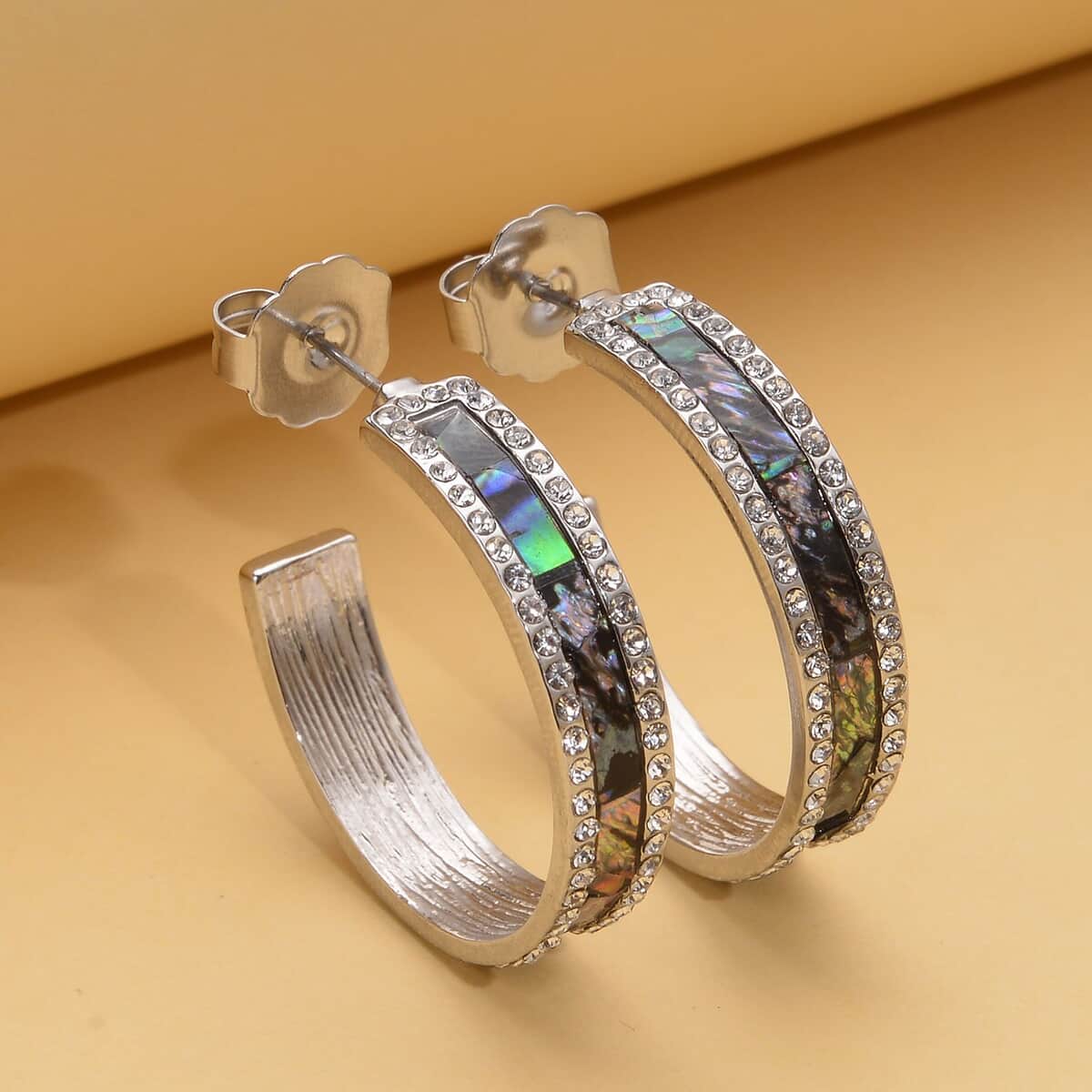 Abalone Shell and White Austrian Crystal Hoop Earrings in Silvertone image number 1