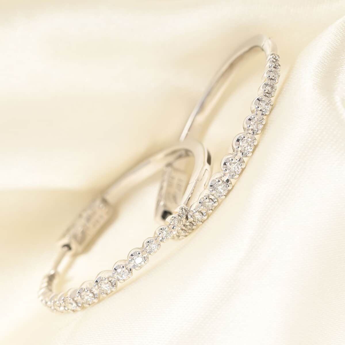 NY Closeout 10K White Gold Diamond Hoop Earrings 7.40 Grams 0.50 ctw image number 1