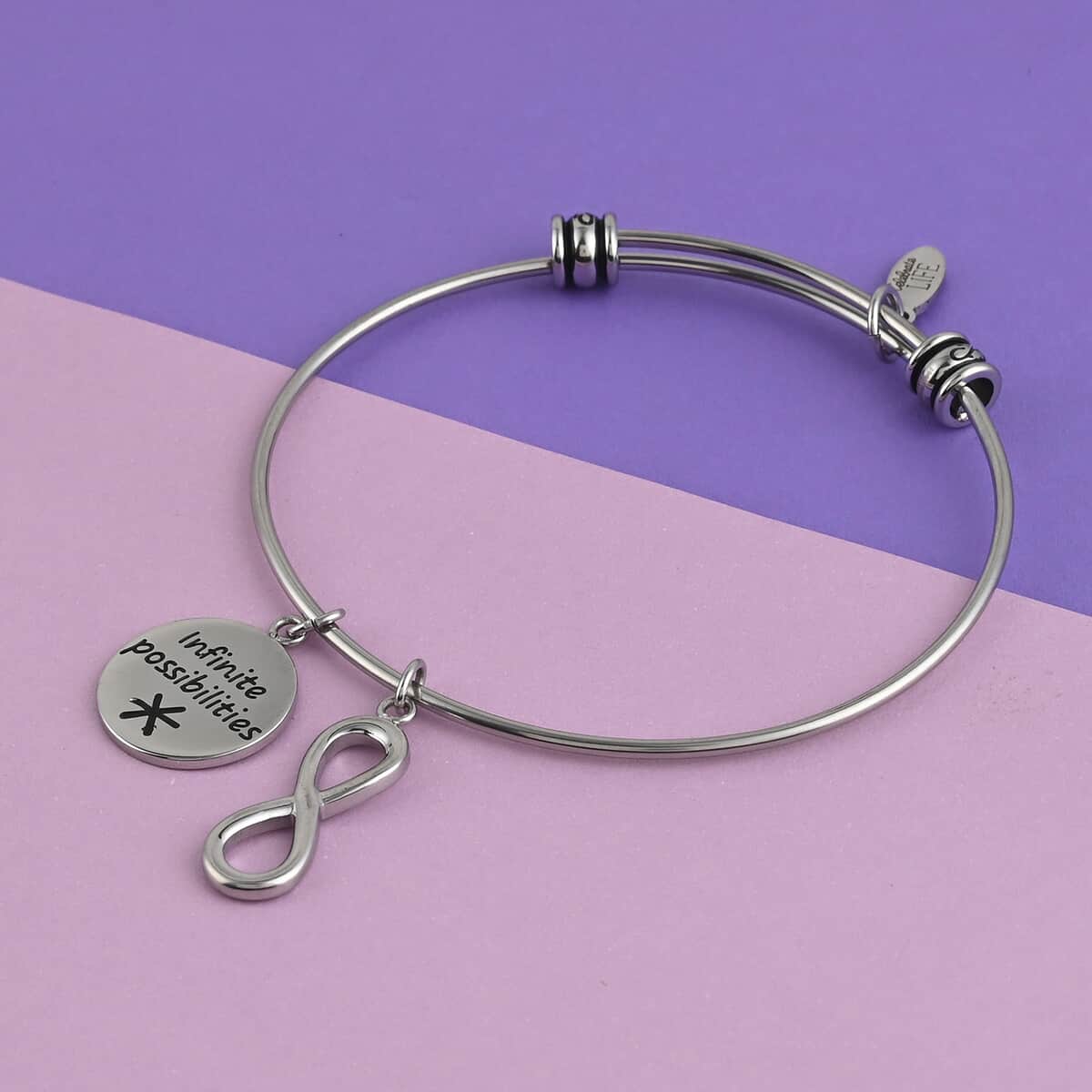 HALLMARK Infinite possibilities Infinity Charm Expandable Wire Bangle Bracelet in Stainless Steel (8.50 In) 10.70 Grams image number 1