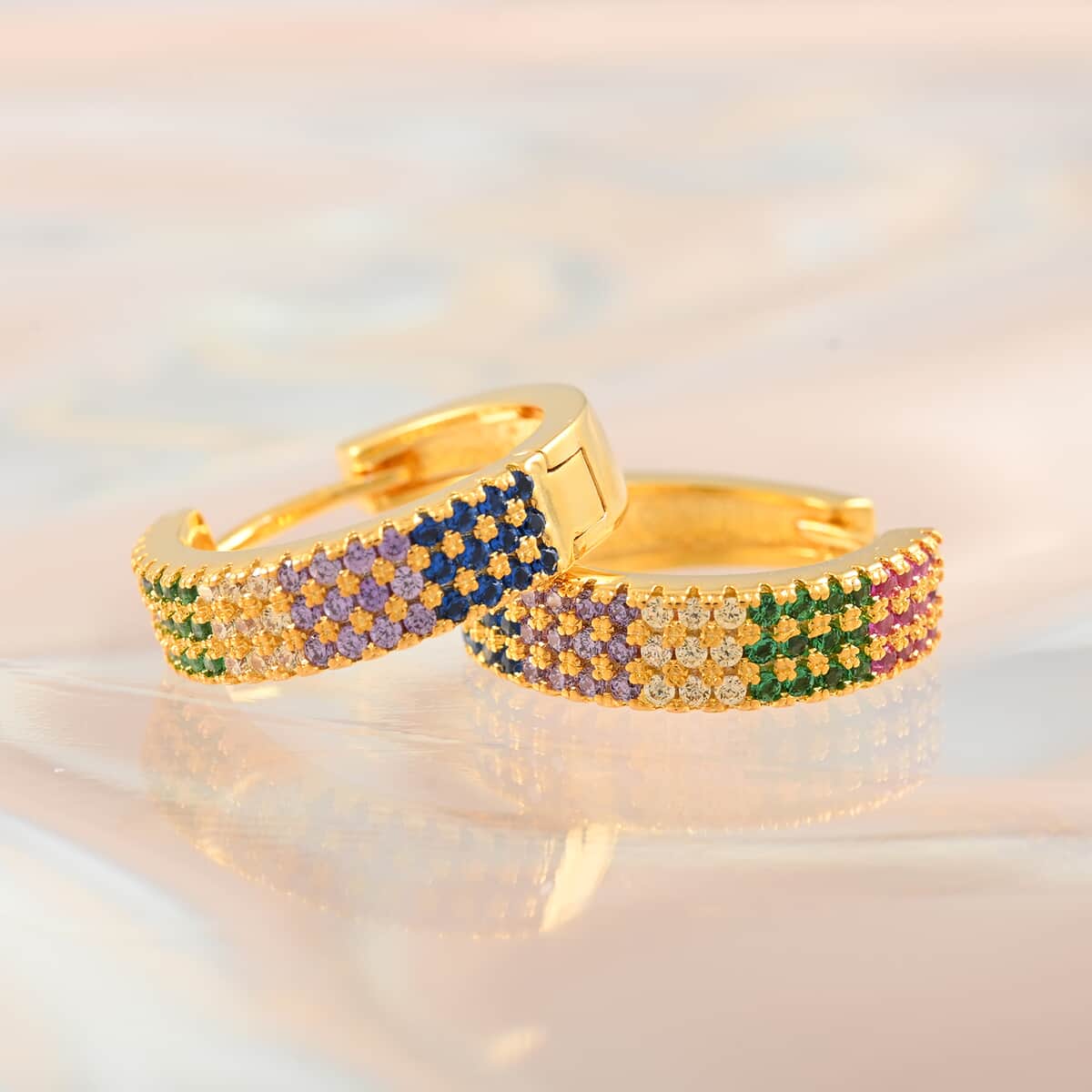 Simulated Multi Color Diamond Huggie Hoop Earrings in Goldtone 1.15 ctw image number 1