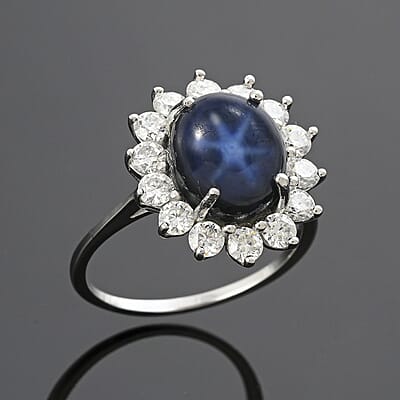 Blue Star Sapphire (DF) and Moissanite 8.75 ctw Halo Ring in Platinum Over Sterling Silver (Size 10.0) 