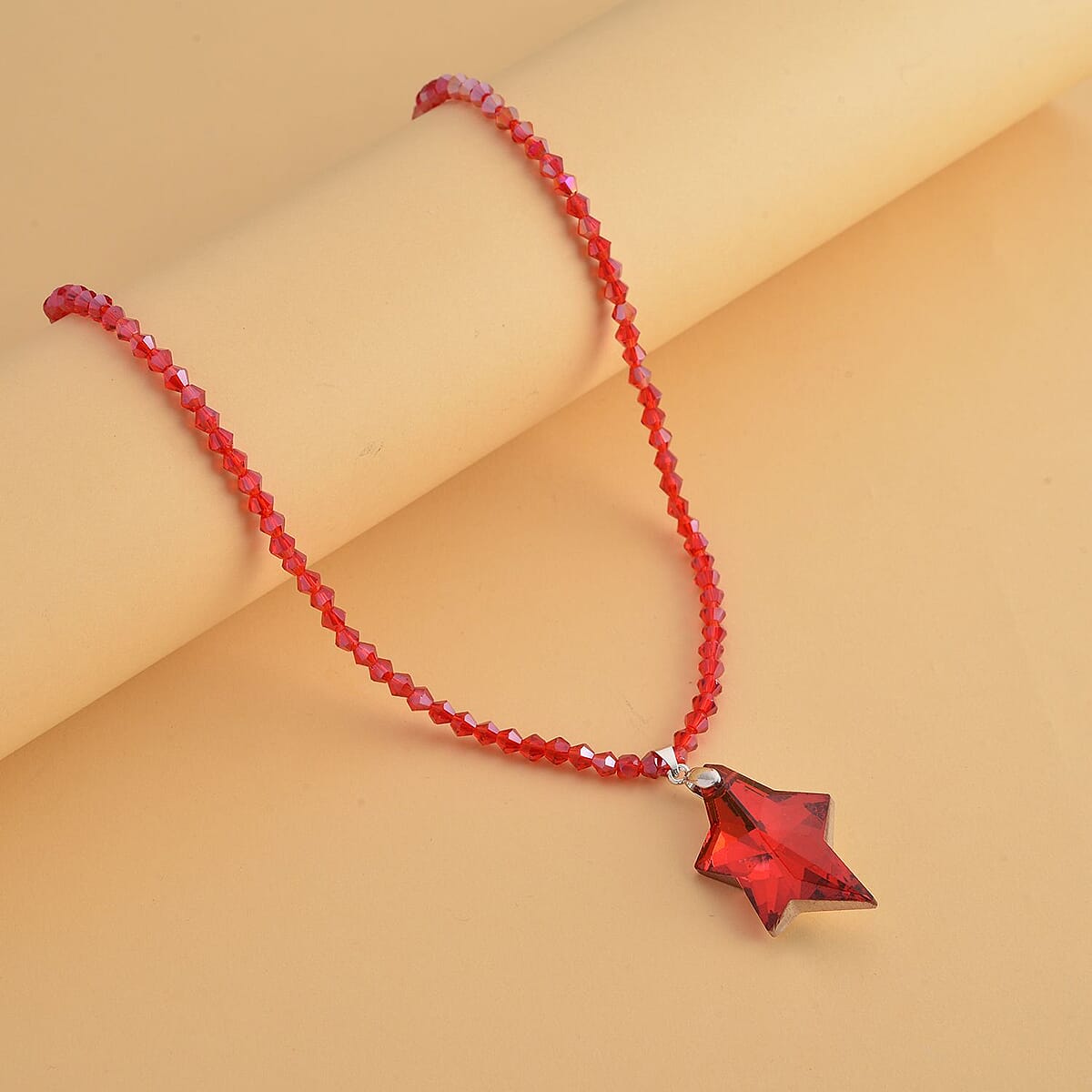 Simulated Ruby Star Pendant with Beaded Necklace in Silvertone 20-22 Inches image number 1