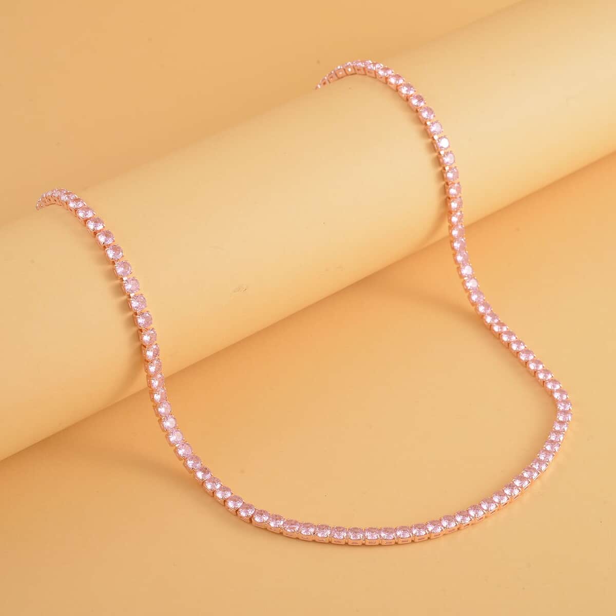 Simulated Red Diamond Tennis Necklace 18-26 Inches with Bolo Slide in Rosetone image number 1